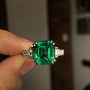 Elegant emerald and diamond ring
